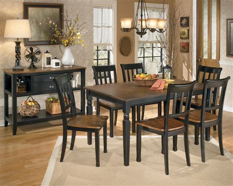 The dining room is open for dinner service. Owingsville Rectangular Dining Room Set from Ashley (D580 ...