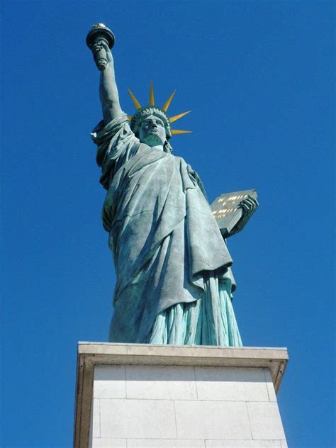 statues of liberty in paris paris forever