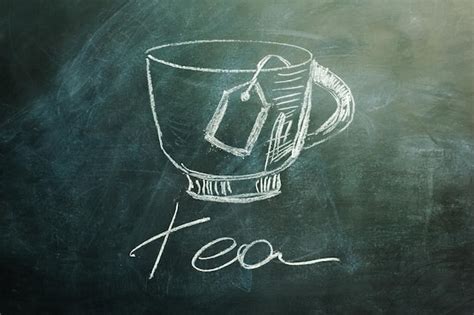 Premium Photo Tea Cup Drawn On A Black Dirty Chalkboard