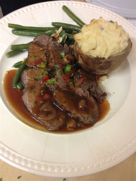 Combine thyme and 1 teaspoon pepper; Sliced Beef Tenderloin with Red Wine Demi Glaze served with Twice Baked Potato and Green Beans ...