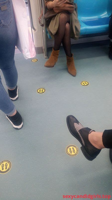 sexycandidgirls top crossed legs in black pantyhose in a subway train creepshot item 1