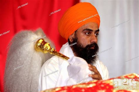CANADA MALTON 06 05 2012 A Sikh Man Fans The Sri Guru Granth Sahib