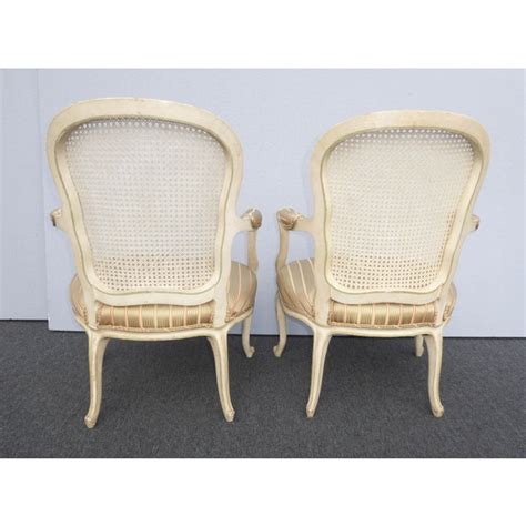 .cane back leather armchair:we've reproduced the classic louis xvi dining chair with a light and airy caned back, a version of the chair popular during the french colonial period. Vintage French Provincial Country Cane Back Arm Chairs - a ...