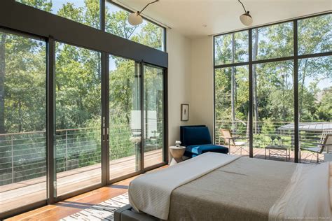 These large colonial grid double hung windows allow natural light to flood a room, making it easier for your to view your computer screen or read a good book. Carlton Woods Residence - Woodlands, TX