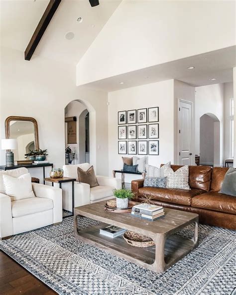 Warm White Walls With Dark Wood Ceiling Beams Gallery Wall And Cozy