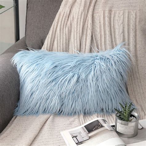 Toss a throw in a luxe material such as sheepskin or wool. Phantoscope Merino Style Faux Fur Series Decorative Throw ...
