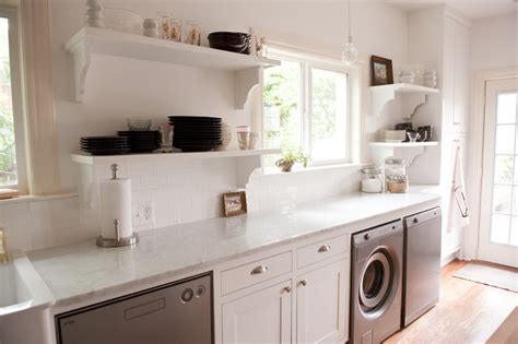 The design star in this laundry room is the natural stone floor. Our bright, white, open kitchen - Traditional - Laundry ...