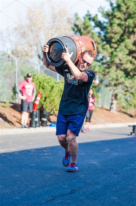 Crossfit Barrel Carry Athletic Man Sports And Recreation Stock Photos