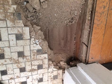 I'm going to lay a tile floor in the bathroom. Want to retile my bathroom, but found masonry filling under old tile - Home Improvement Stack ...