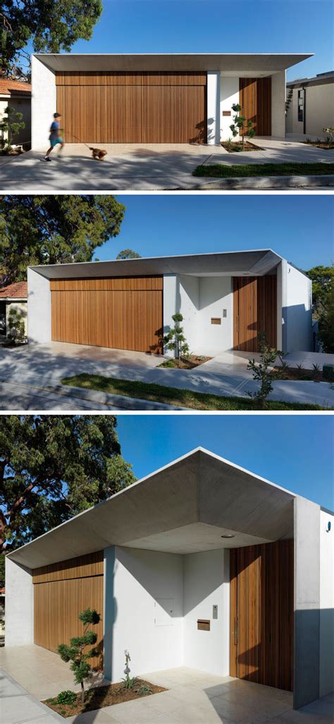 This board is open for your garage doors! This House Hides Multiple Levels Behind Its Minimal Street ...