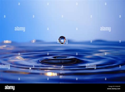 Falling Into Water Droplets Stock Photo Alamy