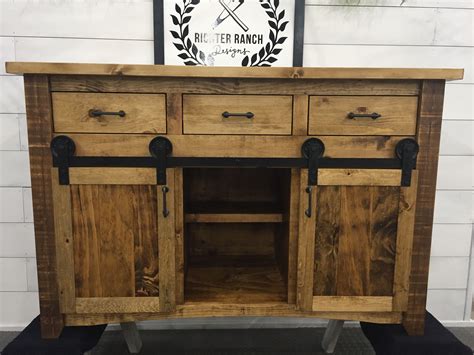 The island can be used for washing or cutting meal ingredients. Hand Crafted Rustic Kitchen Island by Richter Ranch Designs | CustomMade.com