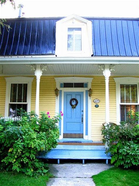 The important point to keep in mind here is contrast. 45. yellow house blue door | home exteriors | Pinterest ...