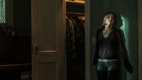 That rare modern horror film that uses tension building and atmosphere. Don't Breathe film: Jane Levy petrified of Stephen Lang