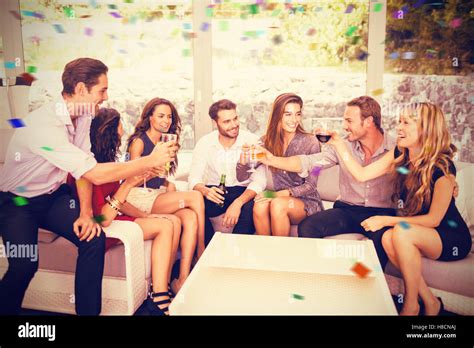 Composite Image Of Group Of Friends Talking And Having Drinks Stock