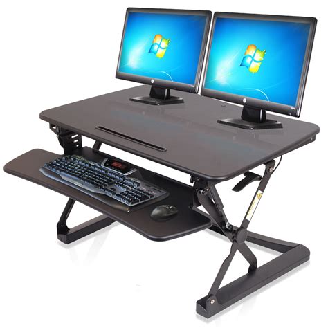 The standing desk, on the more affordable side, can hold up to 350 pounds and comes in eight different sizes and two different frames (wide and narrow). XL ADJUSTABLE HEIGHT SIT STAND STANDING COMPUTER DESK ...