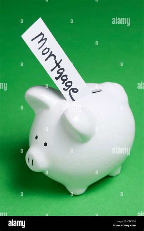 Piggy Banks Bills Coming Out Hi Res Stock Photography And Images Alamy