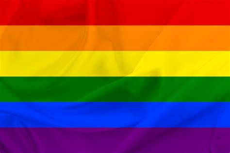 una bandera del arco iris de fondo bandera del orgullo lgbt foto premium