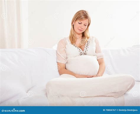 Pregnant Woman Relaxing At Home On The Couch Stock Image Image Of Abdomen Hope 70804767