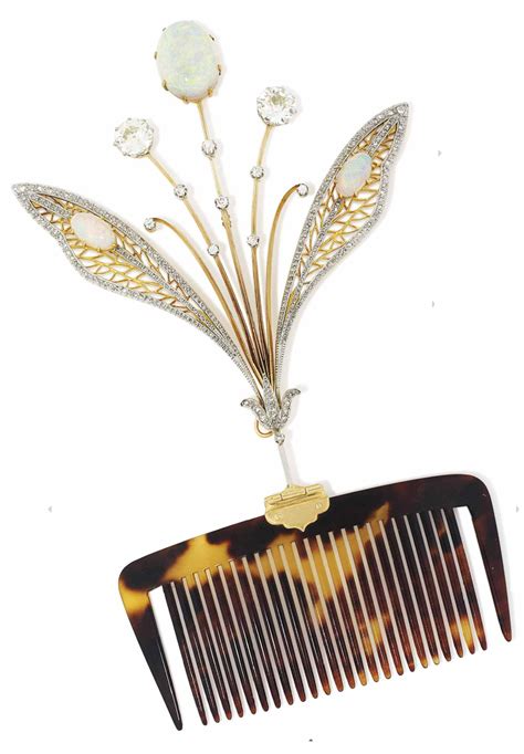 An Art Nouveau Opal And Diamond Hair Comb Circa 1900 Composed Of An