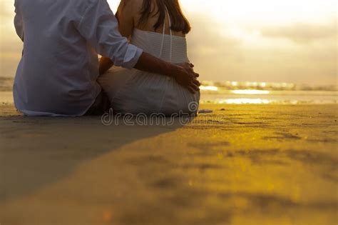 Couple In Love Watching Sunset Together On The Beach Travel Summer