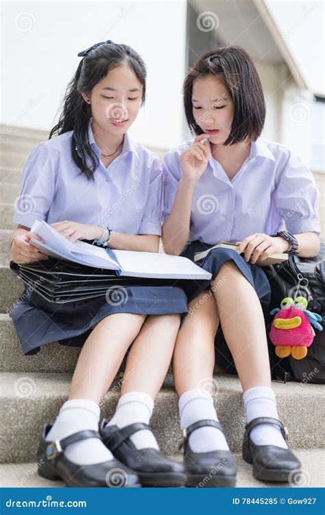 Thai High School Girl In Glasses Show Shocking Expression While Hugging Teddy Bear Royalty Free