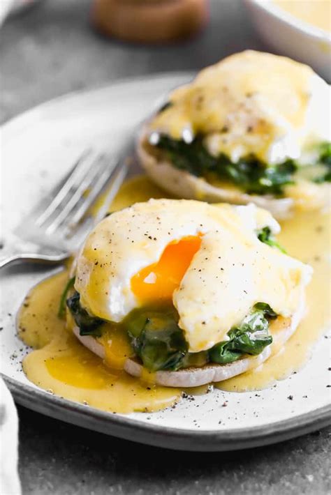 It's made with spinach, poached eggs and then topped with cheese sauce for an indulgent brunch. Eggs Florentine Recipe - Tastes Better From Scratch