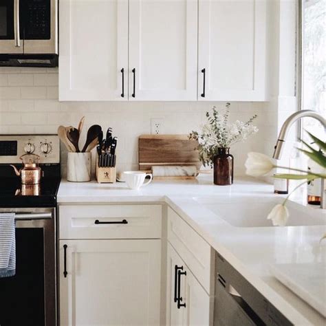 Decorative wood trim for kitchen cabinets. white cabinets with black hardware | Kitchen inspirations ...