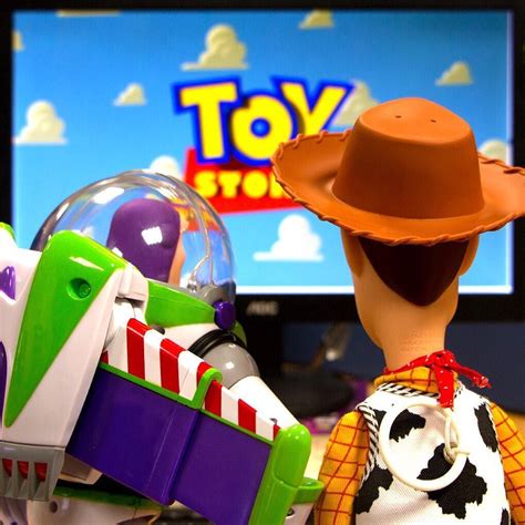 Toy Story Figures Are Posed In Front Of A Television