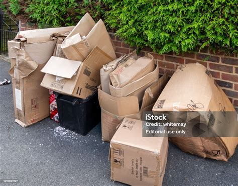 Pile Of Discarded Boxes Waiting For Collection Stock Photo Download