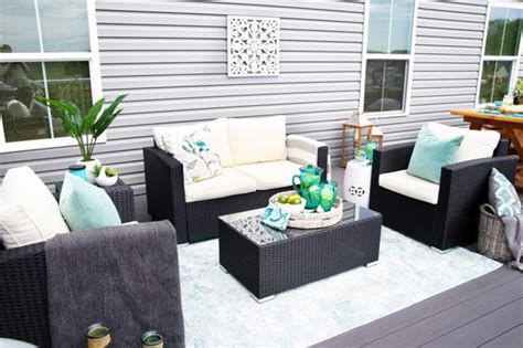 With a few simple, expensive summer decorating ideas, you can transform your small backyard deck into a charming retreat that you can enjoy all summer long. Summer Deck Decorating Ideas | Abby Lawson