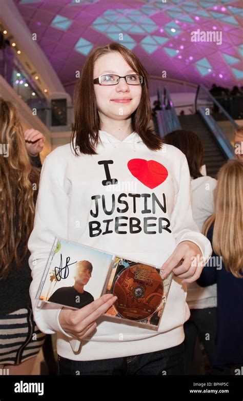 A Justin Bieber Fan Attends Cd Signing Of His New Album At Hmv
