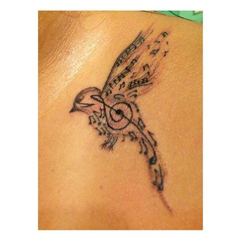 Lovely Music Bird Tattoo On Shoulder
