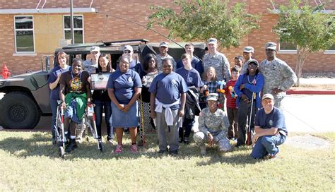 The 85th Civil Affairs Brigade Soldiers Pose With Students Picryl