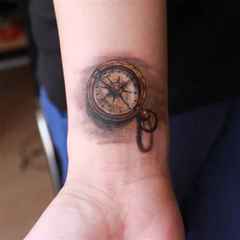 Wrist tattoo with butterfly and heart. 125 Best Compass Tattoos For Men: Cool Design Ideas (2021)
