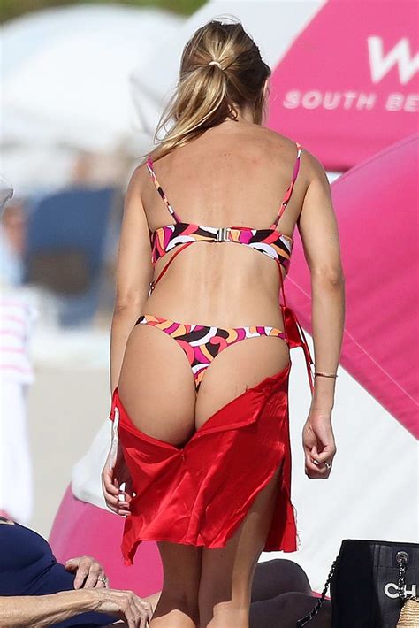 Kimberley Garner Stuns In A Bikini Before Changing Into A Red Silk