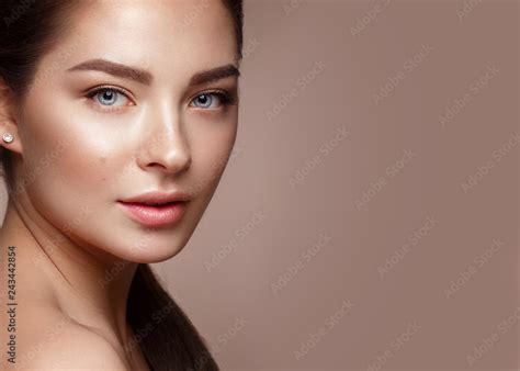 Beautiful Babe Girl With Natural Nude Make Up Beauty Face Stock Photo Adobe Stock