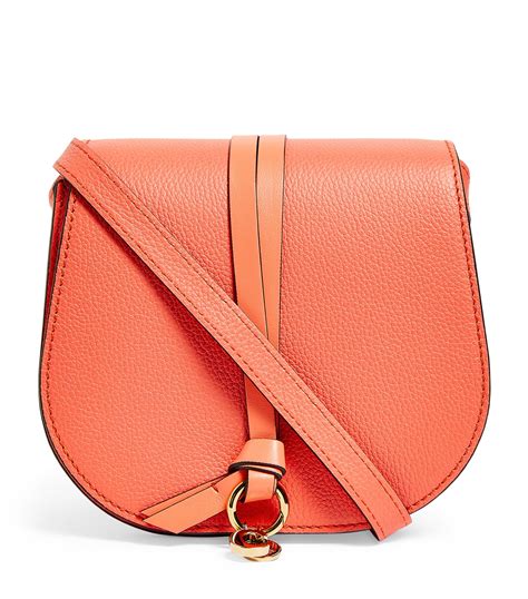 Womens Chloé Orange Mini Leather Alphabet Saddle Bag Harrods Uk