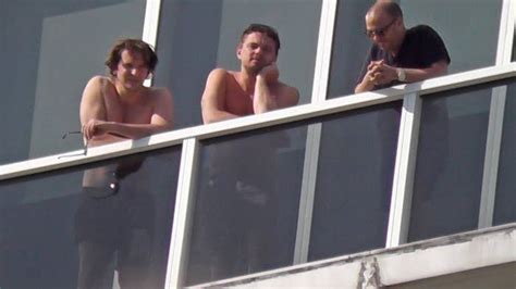 Bradley Cooper And Leonardo Dicaprio Shirtless On A Balcony Together