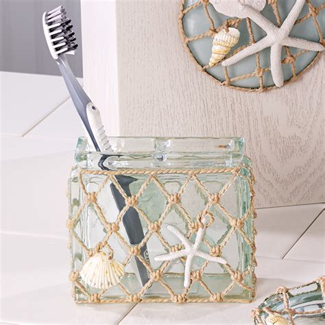 Find glass bath accessories for the master suite. Glass Beach Toothbrush Holder