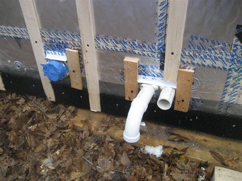 Duct Pipe Penetration With Metal Cap Flashing And Wood Blocking For
