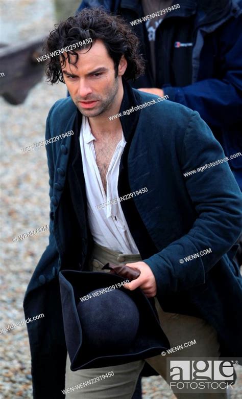 aidan turner who plays poldark in the bbc drama films a scene where he has been fighting and has