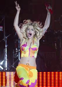 Rita Ora Shows Off Her Toned Midriff In Multi Coloured Neon Cropped Top