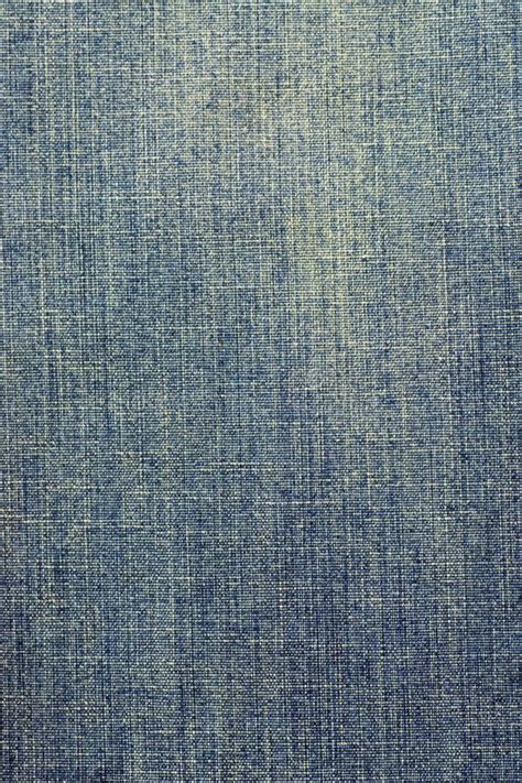 An Image Of Blue Denim Fabric Textured With Natural Dyes And Staining On It