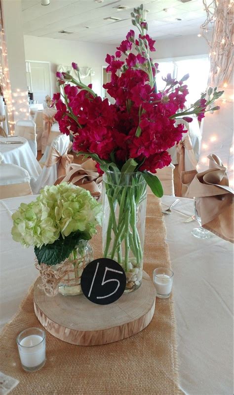 The most impressive, of course, are floral centerpieces. Wedding Reception Centerpiece with Green Hydrangea and Fuschia Stock | Wedding reception ...