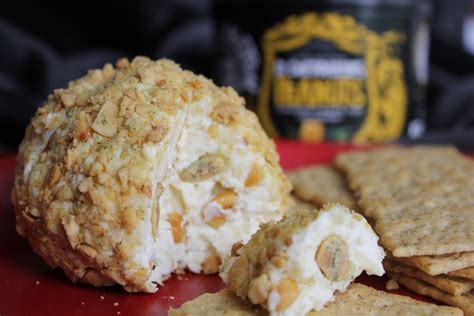 El Cheddarales Cheese Ball With Crackers Lord Nut Levington Cheese Ball Desserts Food