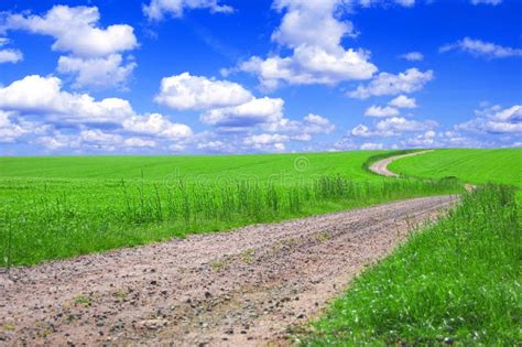 Green Field With Road And Blue Sky Stock Image Image Of Nature Road