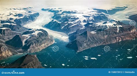 Western Coast Of Greenland Aerial View Of Glacier Mountains And Ocean