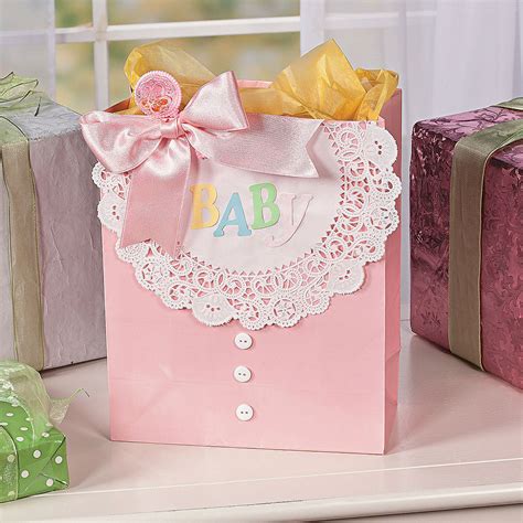 Here's a list of unique baby shower gift ideas including gifts for boys and girls. Baby Gift Bag - OrientalTrading.com | Baby gift bag, Baby ...