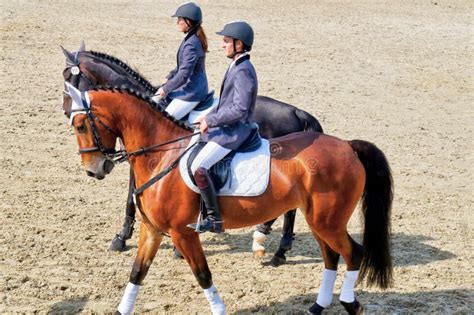 Two Jockeys Horseback Riding On Purebred Horses Editorial Photography